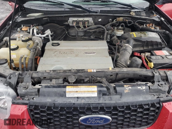 2007 Ford Escape Hybrid z VIN 1FMCU59H47KB77538, wystawiony jako Copart lot #86355294 z przebiegiem 113 539 mil mil oraz Szkoda całkowita • Salvage title. Historia ofert i sprzedaży dostępna na DreamBid. Obrazek 13.
