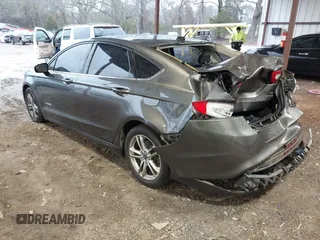 2015 Ford Fusion SE Hybrid with VIN 3FA6P0LU6FR248904, listed as a IAAI auction lot 41556607 with 224,799 mi miles. Bid and sale history available at carsss.com. Image 3.