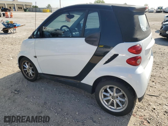 2009 Smart fortwo Passion z VIN WMEEK31X29K274073, wystawiony jako Copart lot #66758044 z przebiegiem 128 564 mil mil oraz Szkoda całkowita • Salvage title. Historia ofert i sprzedaży dostępna na DreamBid. Obrazek 2.