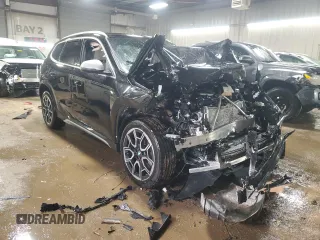 2023 BMW X1 xDrive28i with VIN WBX73EF08P5X85250, listed as a Copart auction lot 50158565 with 7,312 mi miles and Salvage Title. Bid and sale history available at DreamBid. Image 4.