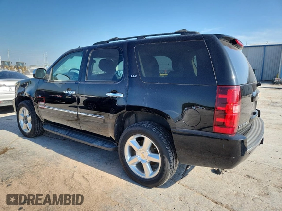 2014 Chevrolet Tahoe LTZ with VIN 1GNSKCE09ER116627, listed as a Copart auction lot 64214685 with 240,970 mi miles and Clean title. Bid and sale history available at DreamBid. Image 2.
