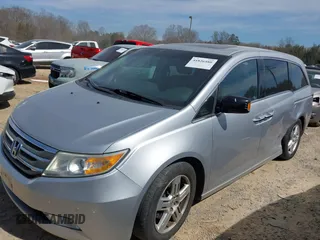 2012 Honda Odyssey Touring with VIN 5FNRL5H92CB108690, listed as a IAAI auction lot 41826580 with 150,327 mi miles and . Bid and sale history available at DreamBid. Image 18.