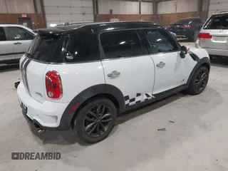 2012 MINI Countryman S with VIN WMWZC5C58CWL60067, listed as a IAAI auction lot 42081725 with 104,397 mi miles and . Bid and sale history available at DreamBid. Image 4.