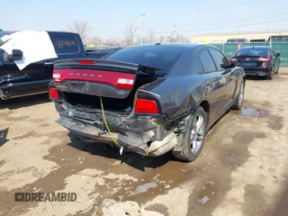 2014 Dodge Charger SXT Plus with VIN 2C3CDXJG0EH104680, listed as a IAAI auction lot 41784303 with 135,771 mi miles. Bid and sale history available at carsss.com. Image 17.