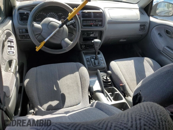 1999 Suzuki Grand Vitara z VIN JS3TD62VXX4100236, wystawiony jako Copart lot #57228075 z przebiegiem Nie podano mil oraz Szkody całkowita. Historia ofert i sprzedaży dostępna na DreamBid. Obrazek 8.