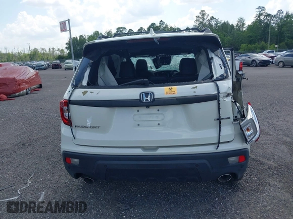 2019 Honda Passport Touring z VIN 5FNYF7H91KB001286, wystawiony jako IAAI lot #41733668 z przebiegiem Nie podano mil oraz . Historia ofert i sprzedaży dostępna na DreamBid. Obrazek 16.