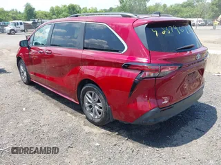 2021 Toyota Sienna XLE with VIN 5TDYSKFC5MS018541, listed as a IAAI auction lot 42579671 with 86,949 mi miles and . Bid and sale history available at DreamBid. Image 3.