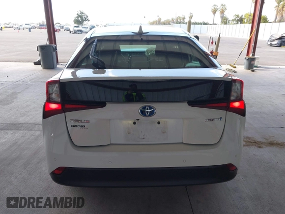 2021 Toyota Prius L Eco z VIN JTDKAMFU5M3146342, wystawiony jako IAAI lot #42249219 z przebiegiem 49 810 mil mil oraz . Historia ofert i sprzedaży dostępna na DreamBid. Obrazek 16.