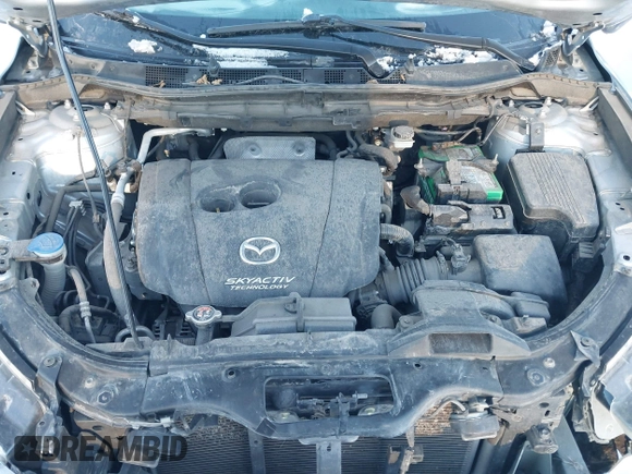 2016 Mazda CX-5 Touring with VIN JM3KE4CY9G0904000, listed as a IAAI auction lot 41186630 with 73,900 mi miles. Bid and sale history available at carsss.com. Image 10.