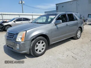 2004 Cadillac SRX z VIN 1GYEE637540179445, wystawiony jako Copart lot #58172235 z przebiegiem 207 598 mil mil oraz Szkody całkowita. Historia ofert i sprzedaży dostępna na DreamBid. Obrazek 1.