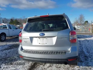 2016 Subaru Forester Touring z VIN JF2SJAXC4GH536085, wystawiony jako IAAI lot #41838081 z przebiegiem 155 930 mil mil oraz . Historia ofert i sprzedaży dostępna na DreamBid. Obrazek 16.