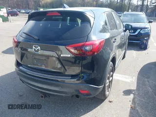 2016 Mazda CX-5 Grand Touring with VIN JM3KE4DY5G0681436, listed as a IAAI auction lot 41664780 with 172,199 mi miles. Bid and sale history available at carsss.com. Image 4.