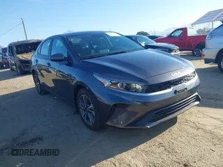 2023 Kia Forte LXS z VIN 3KPF24AD8PE651732, wystawiony jako IAAI lot #41868795 z przebiegiem 26 106 mil mil oraz . Historia ofert i sprzedaży dostępna na DreamBid. Obrazek 1.