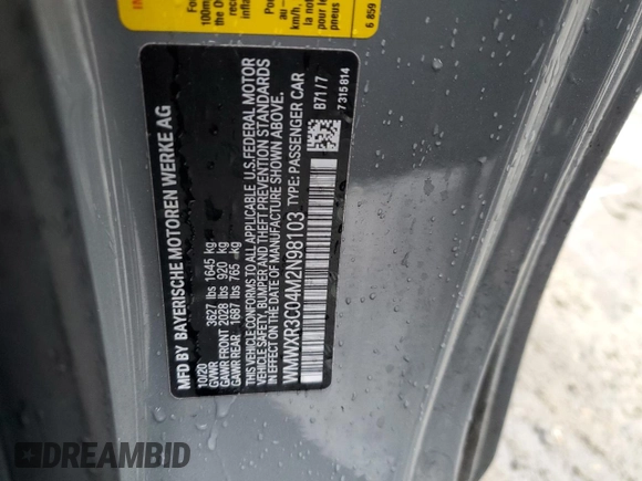 2021 MINI Hardtop Cooper with VIN WMWXR3C04M2N98103, listed as a Copart auction lot 42589255 with 61,317 mi miles and Salvage title. Bid and sale history available at DreamBid. Image 12.