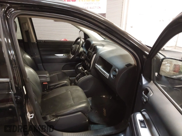 2016 Jeep Compass Latitude with VIN 1C4NJCEA5GD548777, listed as a IAAI auction lot 41263925 with 155,214 mi miles and . Bid and sale history available at DreamBid. Image 5.