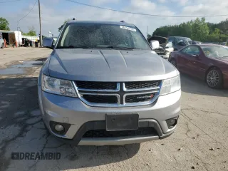 2017 Dodge Journey SXT with VIN 3C4PDCBG5HT526573, listed as a Copart auction lot 56756255 with 194,076 mi miles and Salvage title. Bid and sale history available at DreamBid. Image 5.