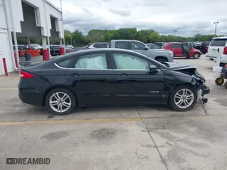 2018 Ford Fusion Hybrid SE with VIN 3FA6P0LU9JR286359, listed as a IAAI auction lot 41973064 with 145,267 mi miles. Bid and sale history available at carsss.com. Image 13.