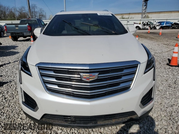 2018 Cadillac XT5 Premium Luxury FWD z VIN 1GYKNERS3JZ139719, wystawiony jako Copart lot #52436595 z przebiegiem Nie podano mil oraz Szkody całkowita. Historia ofert i sprzedaży dostępna na DreamBid. Obrazek 5.