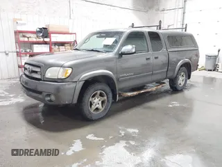 2003 Toyota Tundra SR5 with VIN 5TBRT34113S435509, listed as a IAAI auction lot 41997756 with 203,219 mi miles and . Bid and sale history available at carsss.com. Image 2.
