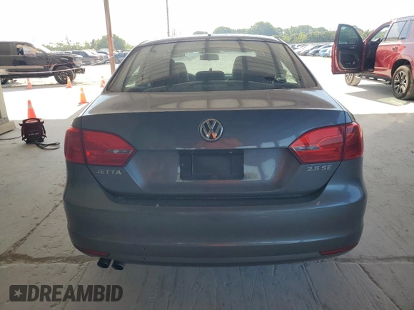 2013 Volkswagen Jetta SE with VIN 3VWDX7AJ9DM254156, listed as a Copart auction lot 57632355 with Not provided miles and Salvage title. Bid and sale history available at DreamBid. Image 6.