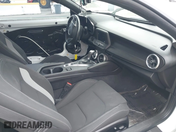2017 Chevrolet Camaro 1LT z VIN 1G1FB1RX2H0165336, wystawiony jako IAAI lot #42041620 z przebiegiem 70 652 mil mil oraz . Historia ofert i sprzedaży dostępna na DreamBid. Obrazek 5.