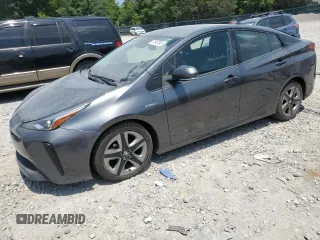 2021 Toyota Prius L Eco с VIN JTDKAMFU5M3141383, выставлен на аукционе Copart как лот 61947835 с пробегом 136 300 миль миль и Чистый • Clean title. История ставок и продаж доступна на DreamBid. Изображение 1.