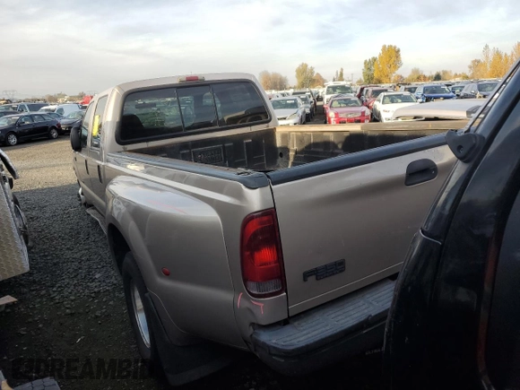 1999 Ford F-350 XL with VIN 1FTWW32F4XED06675, listed as a Copart auction lot 78982514 with 329,060 mi miles and Salvage title. Bid and sale history available at DreamBid. Image 2.