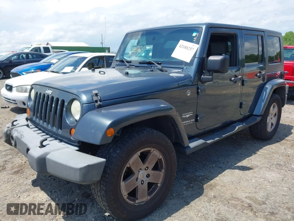 2007 Jeep Wrangler Unlimited Sahara with VIN 1J4GA59117L216687, listed as a IAAI auction lot 42188257 with 176,507 mi miles and . Bid and sale history available at DreamBid. Image 20.