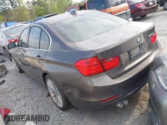 2012 BMW 3 Series 328i with VIN WBA3A5C5XCF349888, listed as a IAAI auction lot 41954810 with 163,070 mi miles. Bid and sale history available at carsss.com. Image 3.