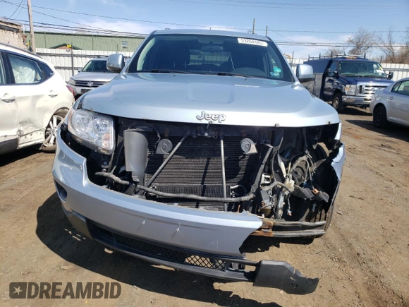 2012 Jeep Grand Cherokee Laredo with VIN 1C4RJFAG5CC222569, listed as a Copart auction lot 53264185 with 153,921 mi miles and Salvage Title. Bid and sale history available at carsss.com. Image 5.