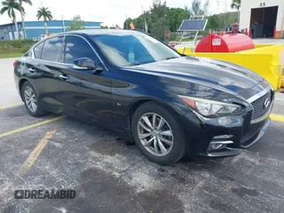 2015 Infiniti Q50 Premium z VIN JN1BV7ARXFM410793, wystawiony jako IAAI lot #42793442 z przebiegiem 70 648 mil mil oraz . Historia ofert i sprzedaży dostępna na DreamBid. Obrazek 1.