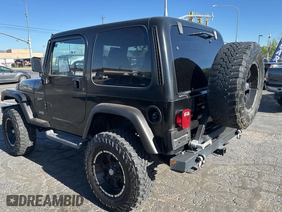 2002 Jeep Wrangler Sport with VIN 1J4FA49S32P765579, listed as a Copart auction lot 55244845 with 127,791 mi miles and Clean Title. Bid and sale history available at carsss.com. Image 3.