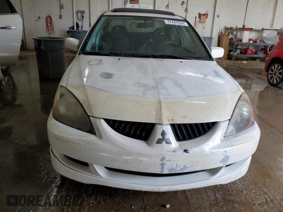 2004 Mitsubishi Lancer with VIN JA3AJ66F64U029144, listed as a Copart auction lot 77437234 with 158,049 mi miles and Salvage Title. Bid and sale history available at DreamBid. Image 5.