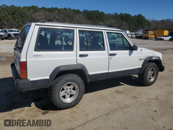 1995 Jeep Cherokee Sport with VIN 1J4FJ68S0SL646747, listed as a Copart auction lot 48772675 with 239,834 mi miles and Salvage title. Bid and sale history available at DreamBid. Image 3.