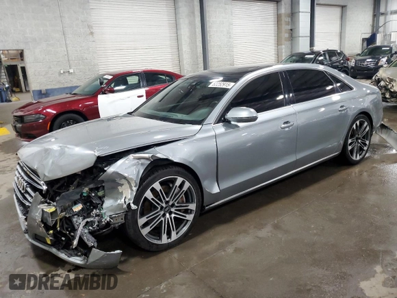2012 Audi A8 z VIN WAURVAFD3CN025035, wystawiony jako Copart lot #52252915 z przebiegiem 71 312 mil mil oraz Szkoda całkowita • Salvage title. Historia ofert i sprzedaży dostępna na DreamBid. Obrazek 1.