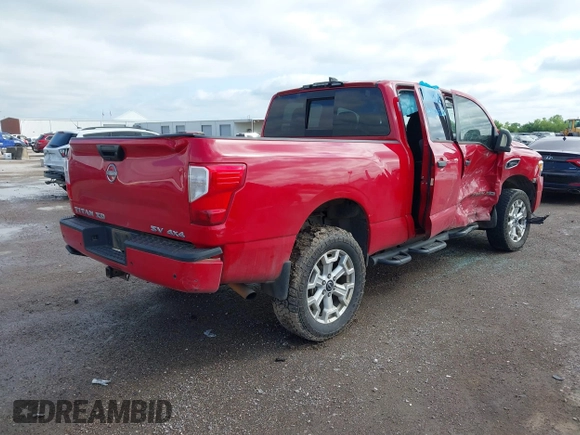 2023 Nissan Titan Pro-4X with VIN 1N6AA1FB9PN104089, listed as a IAAI auction lot 42202488 with 58,151 mi miles and . Bid and sale history available at DreamBid. Image 4.