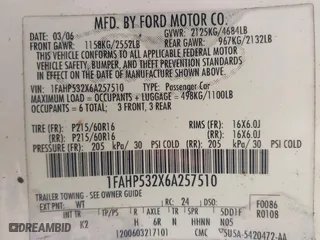 2006 Ford Taurus SE with VIN 1FAHP532X6A257510, listed as a IAAI auction lot 41892422 with 130,633 mi miles. Bid and sale history available at carsss.com. Image 9.