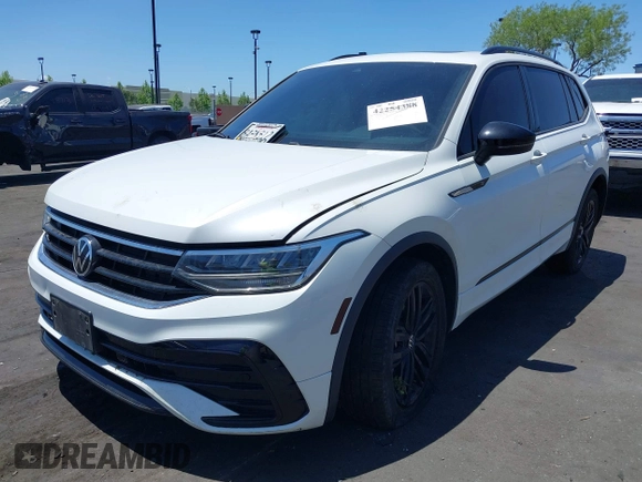 2022 Volkswagen Tiguan SE R-Line Black with VIN 3VVCB7AX3NM073218, listed as a IAAI auction lot 42254388 with 31,998 mi miles and . Bid and sale history available at DreamBid. Image 21.