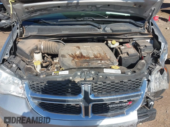 2015 Dodge Grand Caravan SXT with VIN 2C4RDGCG1FR649074, listed as a IAAI auction lot 41759409 with 116,856 mi miles and . Bid and sale history available at DreamBid. Image 10.