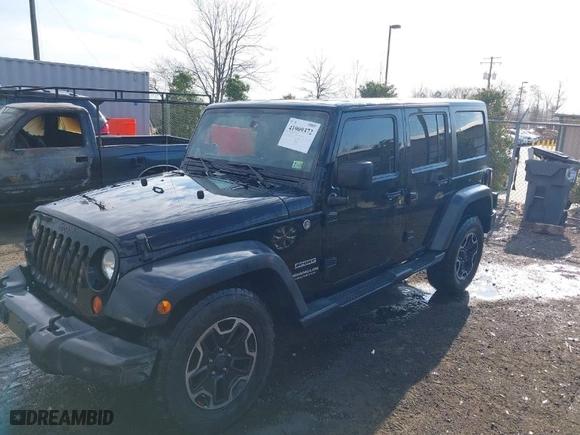 2013 Jeep Wrangler Unlimited Freedom Edition with VIN 1C4BJWDG8DL648870, listed as a IAAI auction lot 41909372 with 184,203 mi miles. Bid and sale history available at carsss.com. Image 2.