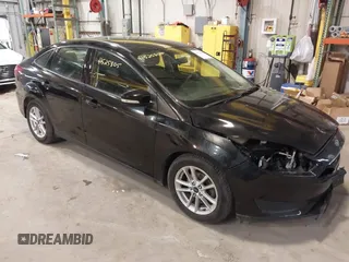 2017 Ford Focus SE with VIN 1FADP3F22HL292063, listed as a IAAI auction lot 41525805 with 104,760 mi miles and . Bid and sale history available at DreamBid. Image 1.
