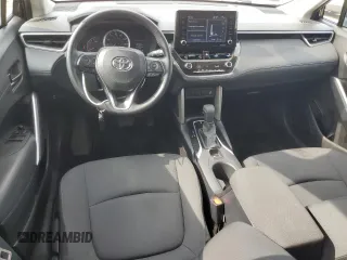 2022 Toyota Corolla Cross LE with VIN 7MUCAABG3NV021235, listed as a Copart auction lot 60644285 with 82,403 mi miles and Clean title. Bid and sale history available at DreamBid. Image 8.