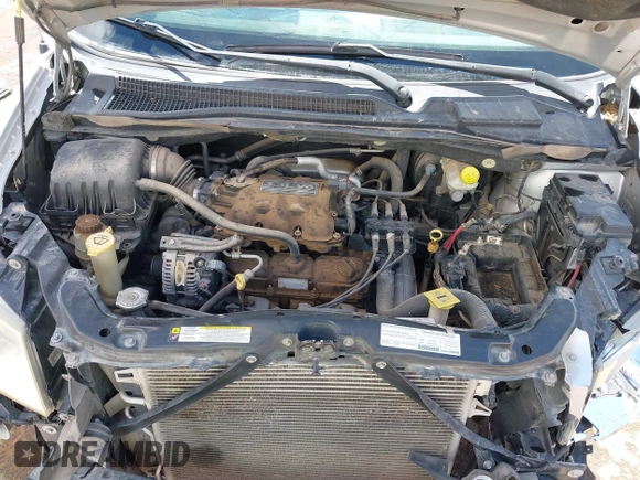 2008 Dodge Grand Caravan SE with VIN 2D8HN44H78R667145, listed as a IAAI auction lot 42654330 with 230,966 mi miles and . Bid and sale history available at DreamBid. Image 10.