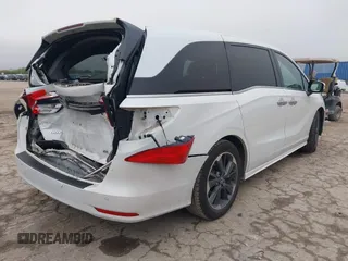 2022 Honda Odyssey Elite z VIN 5FNRL6H96NB039950, wystawiony jako IAAI lot #41907106 z przebiegiem 67 490 mil mil oraz . Historia ofert i sprzedaży dostępna na DreamBid. Obrazek 4.