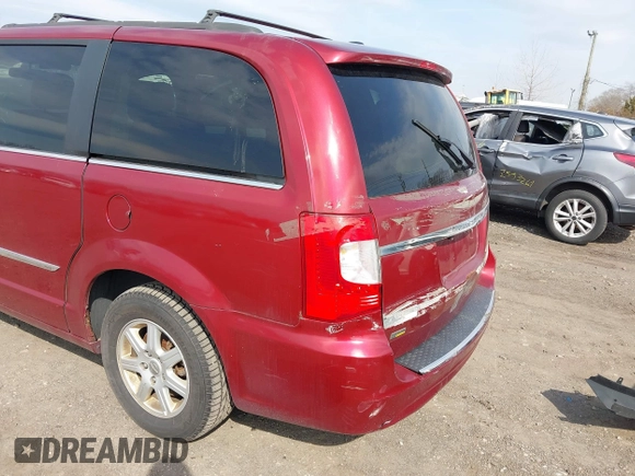 2012 Chrysler Town & Country Touring with VIN 2C4RC1BG5CR400323, listed as a IAAI auction lot 41902471 with 999,999 mi miles. Bid and sale history available at carsss.com. Image 6.
