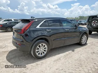 2023 Cadillac XT4 FWD Luxury with VIN 1GYAZAR46PF178003, listed as a Copart auction lot 59121545 with 42,000 mi miles and Salvage title. Bid and sale history available at DreamBid. Image 3.