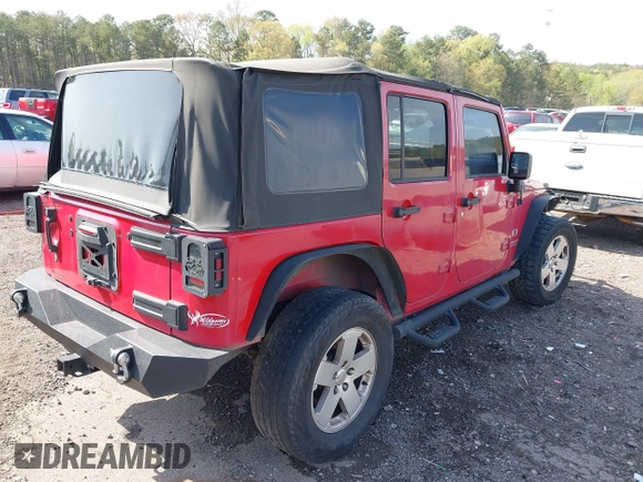 2007 Jeep Wrangler Unlimited X with VIN 1J4GB39197L150245, listed as a IAAI auction lot 41920390 with 239,532 mi miles and . Bid and sale history available at DreamBid. Image 4.