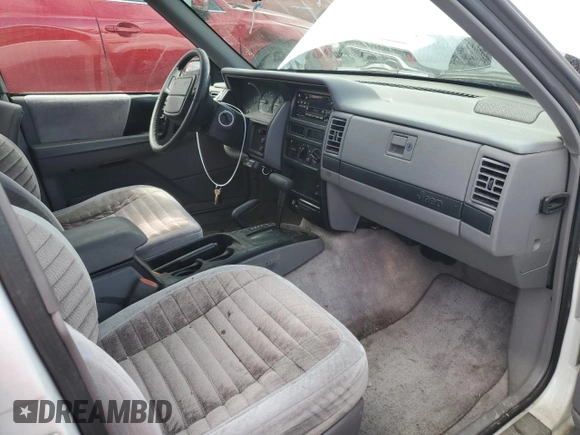 1994 Jeep Grand Cherokee Laredo with VIN 1J4GZ58Y2RC207099, listed as a Copart auction lot 71176114 with 127,110 mi miles and Salvage Title. Bid and sale history available at carsss.com. Image 8.