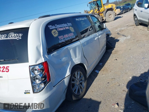 2019 Dodge Grand Caravan SXT with VIN 2C4RDGCG1KR545775, listed as a IAAI auction lot 42061287 with 131,603 mi miles and . Bid and sale history available at DreamBid. Image 6.