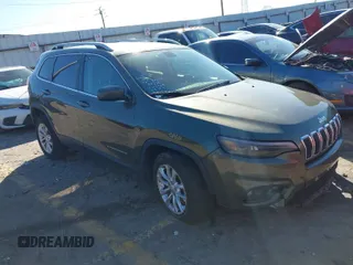 2019 Jeep Cherokee Latitude with VIN 1C4PJLCB6KD411506, listed as a IAAI auction lot 41597103 with 110,303 mi miles. Bid and sale history available at carsss.com. Image 1.